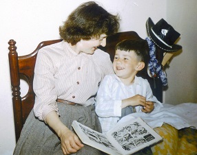 Leigh Hobbs as a child with his mother reading a book in bed.